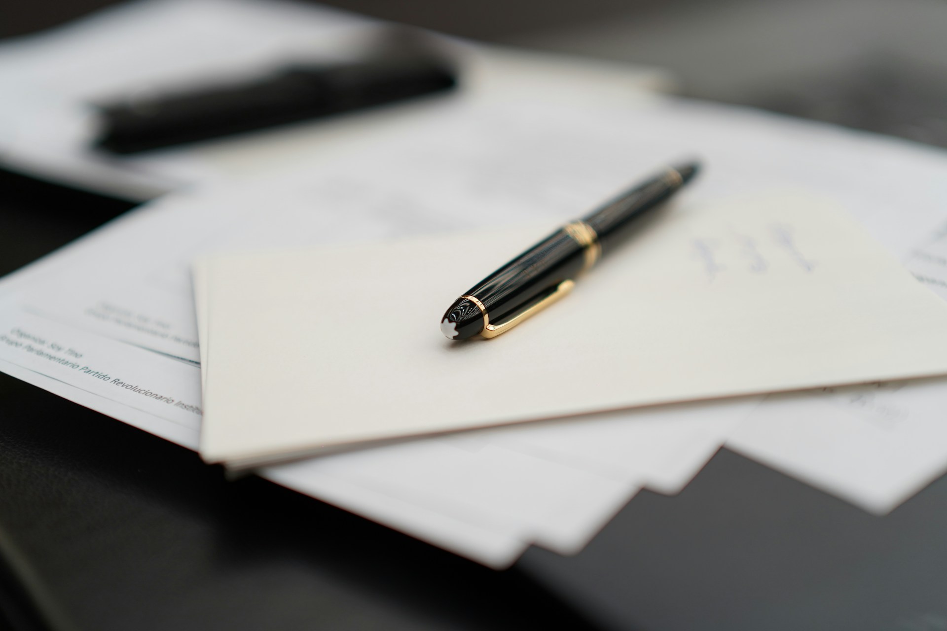 legal document paperwork with pen