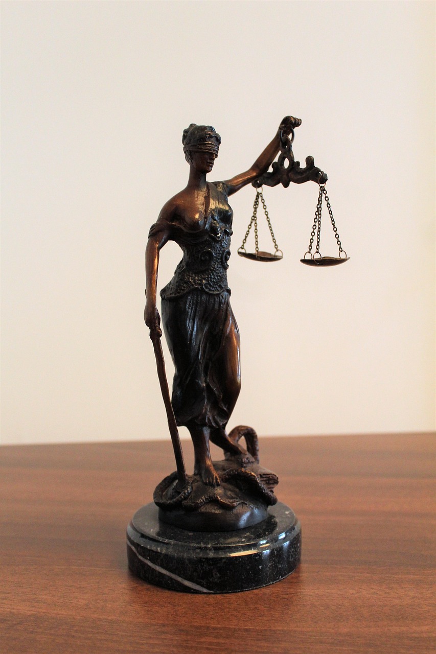 lady justice statue on desktop